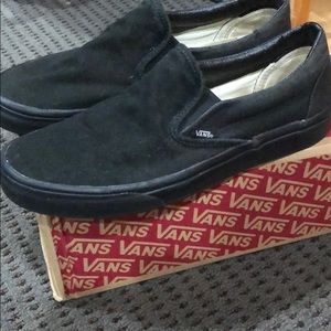 Black slip on vans.